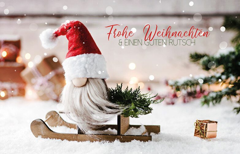 Weihnachtskarte: Lässig auf dem Schlitten